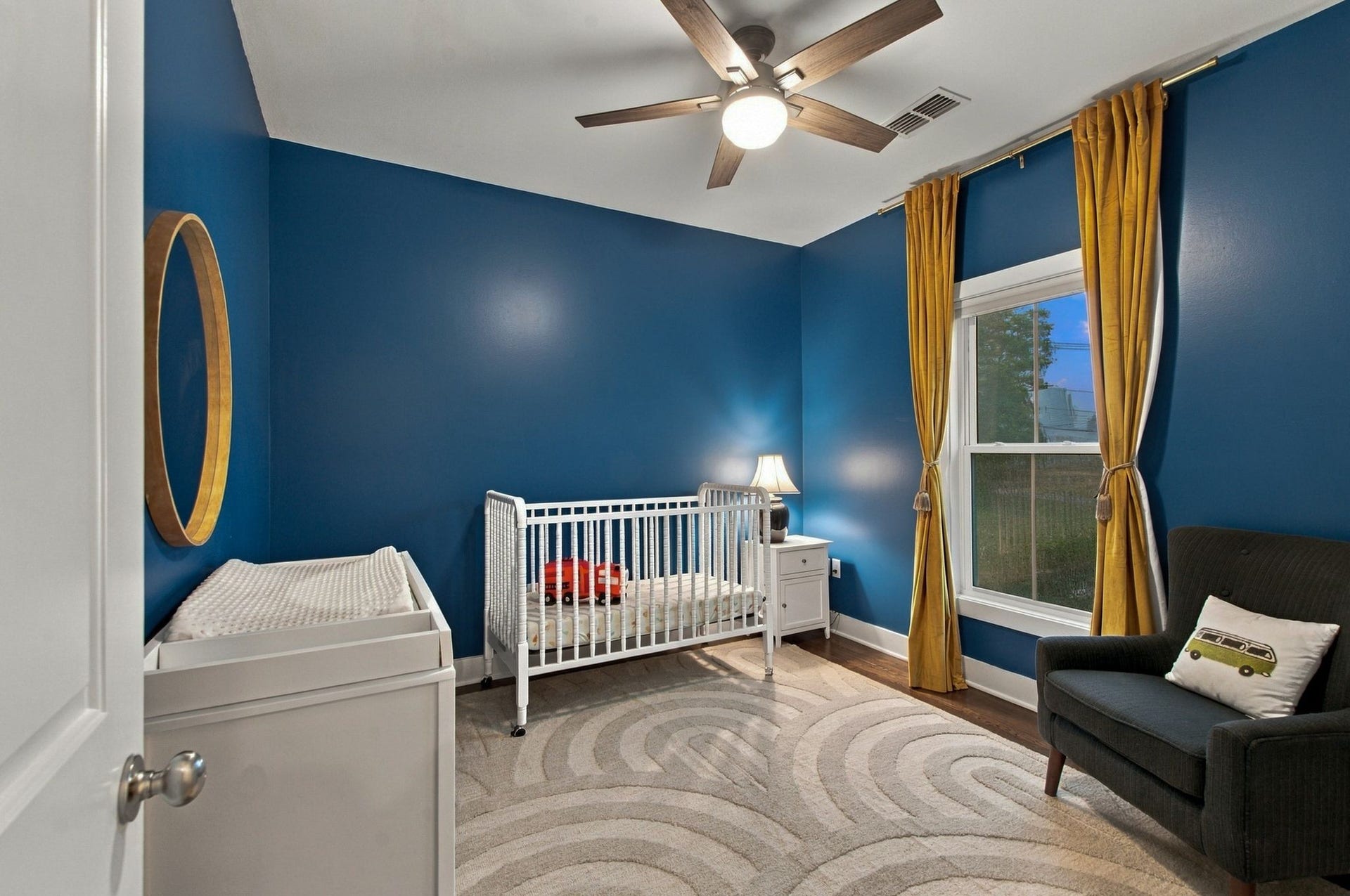 Bedroom #2 has a ceiling fan and great natural light
