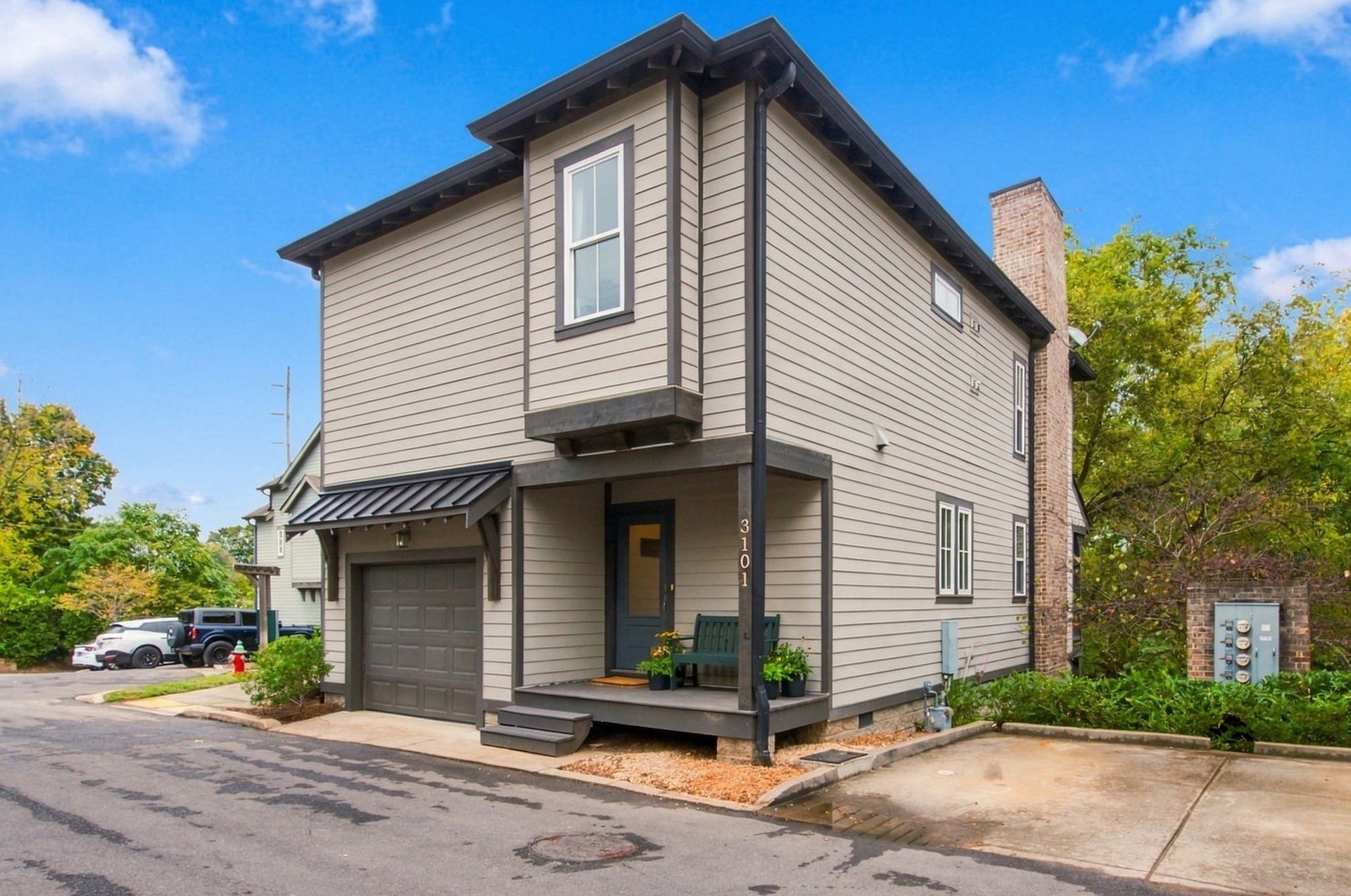 The home has a one car garage and a dedicated parking space, in addition to being conveniently located near open guest parking spaces