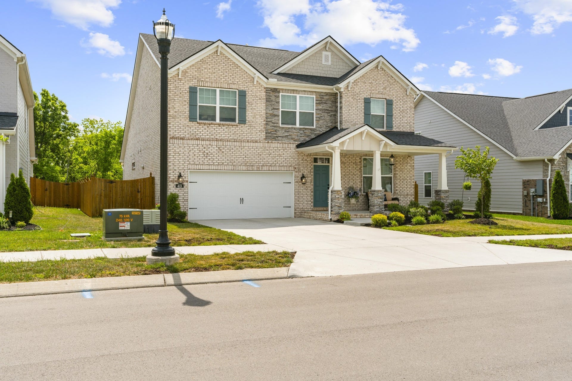 413 Mabels Way, Mount Juliet, TN 37122 Classic brick exterior, covered front porch and thoughtfully finished landscaping create welcoming curb appeal.