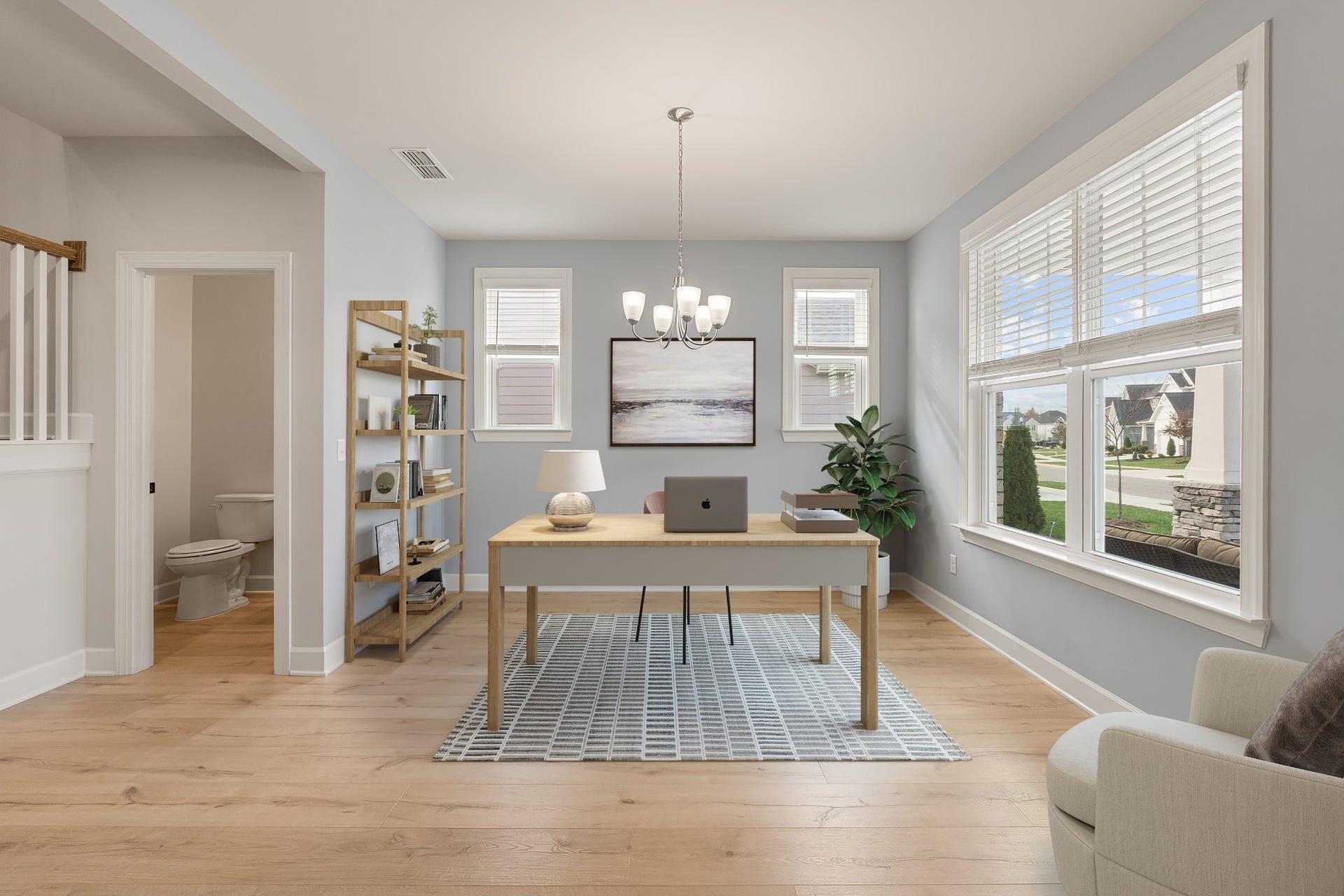 413 Mabels Way, Mount Juliet, TN 37122 The Landon floor plan balances open living areas with private bedrooms and flexible spaces on both levels. Virtually enhanced photo shows the potential office set up in the flex space.