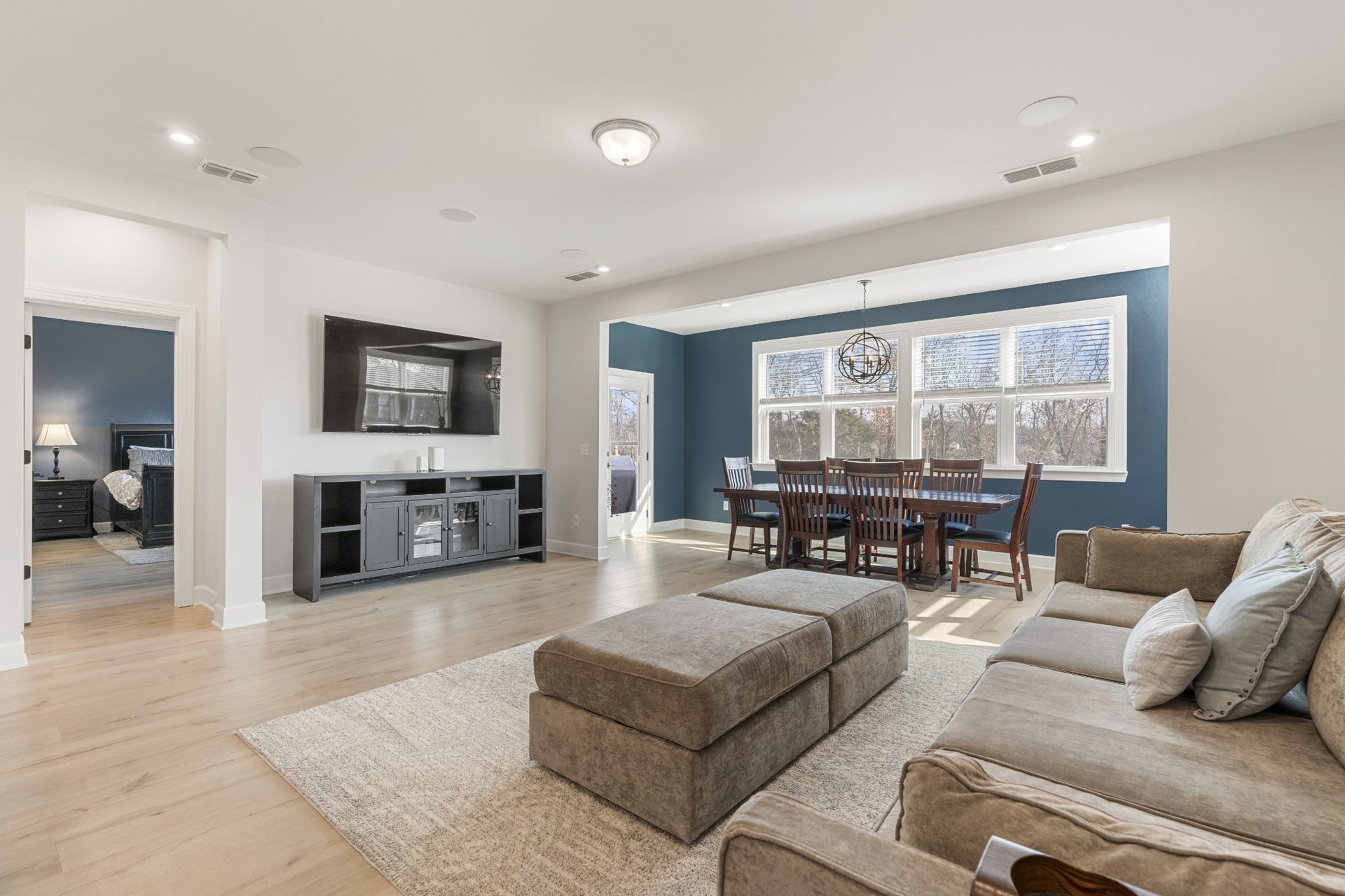 413 Mabels Way, Mount Juliet, TN 37122 The spacious living room features high ceilings, abundant natural light and plenty of room for comfortable seating.