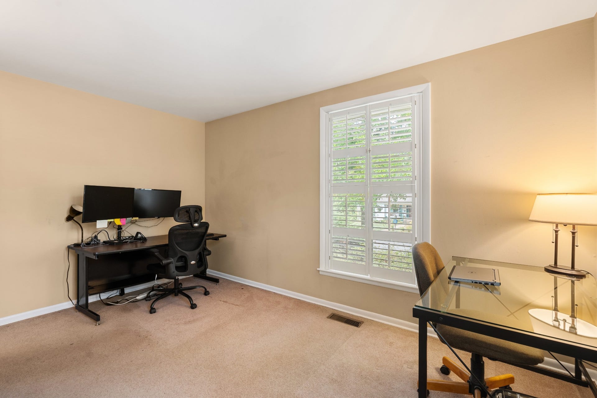 930 Percy Warner Blvd, Nashville, TN 37205 with 4 bedrooms this one is utilized as an office. wood plantion blinds in 3 of the bedrooms.