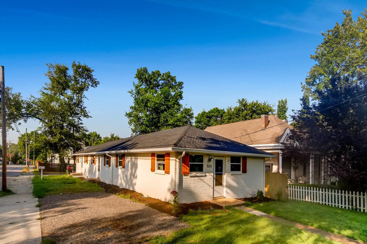 1520 Russell St, #A, Nashville, TN 37206 End unit with a front yard area and adjacent parking pad.
