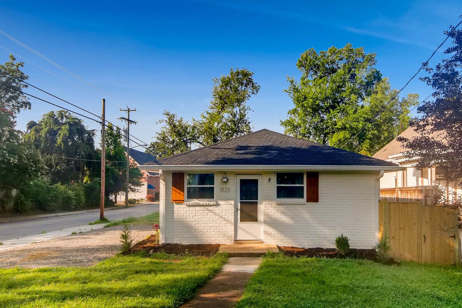 1520 Russell St, #A, Nashville, TN 37206 End unit with a front yard area and adjacent parking pad.