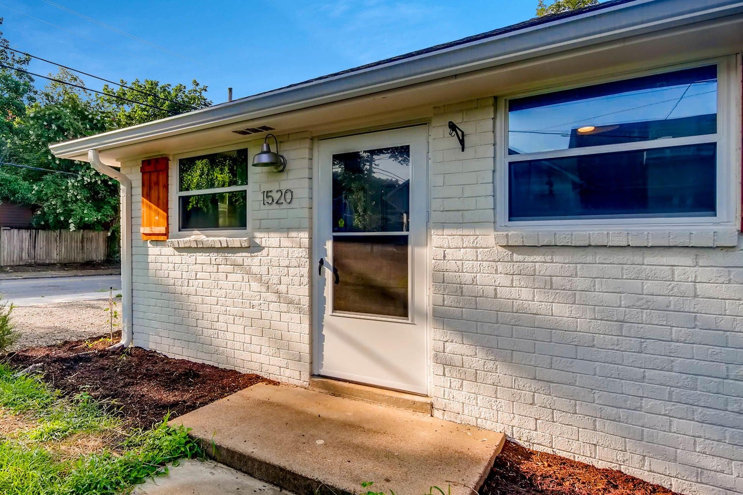 1520 Russell St, #A, Nashville, TN 37206 End unit with a front yard area and adjacent parking pad.
