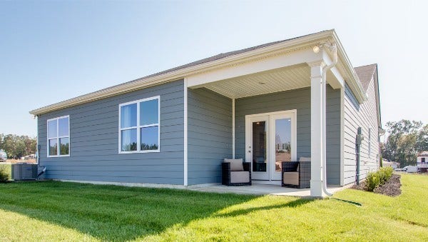 162 Olivia Cir, Chapel Hill, TN 37034 Very private! Enjoy the quietness and serenity of this cozy covered back porch overlooking pond and grassy common areas. Secluded even more by partial fence. Photo of a model home same plan.