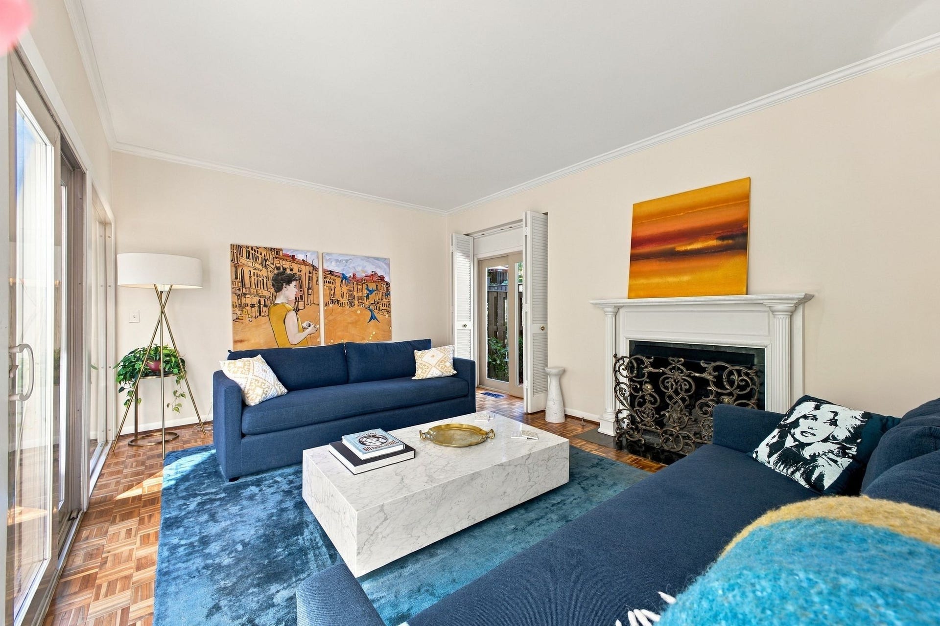 Inviting Living Room centered around a Classic Fireplace