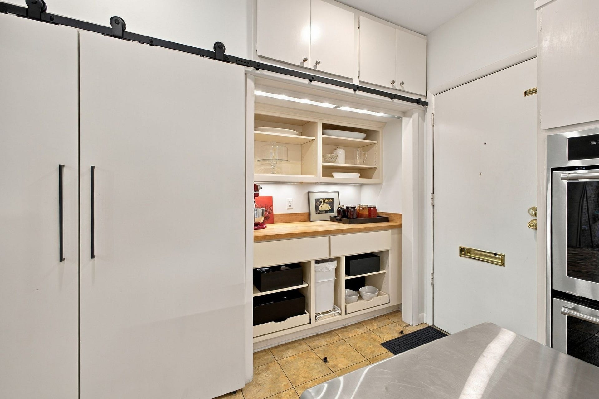 The Laundry is hidden behind the sliding doors