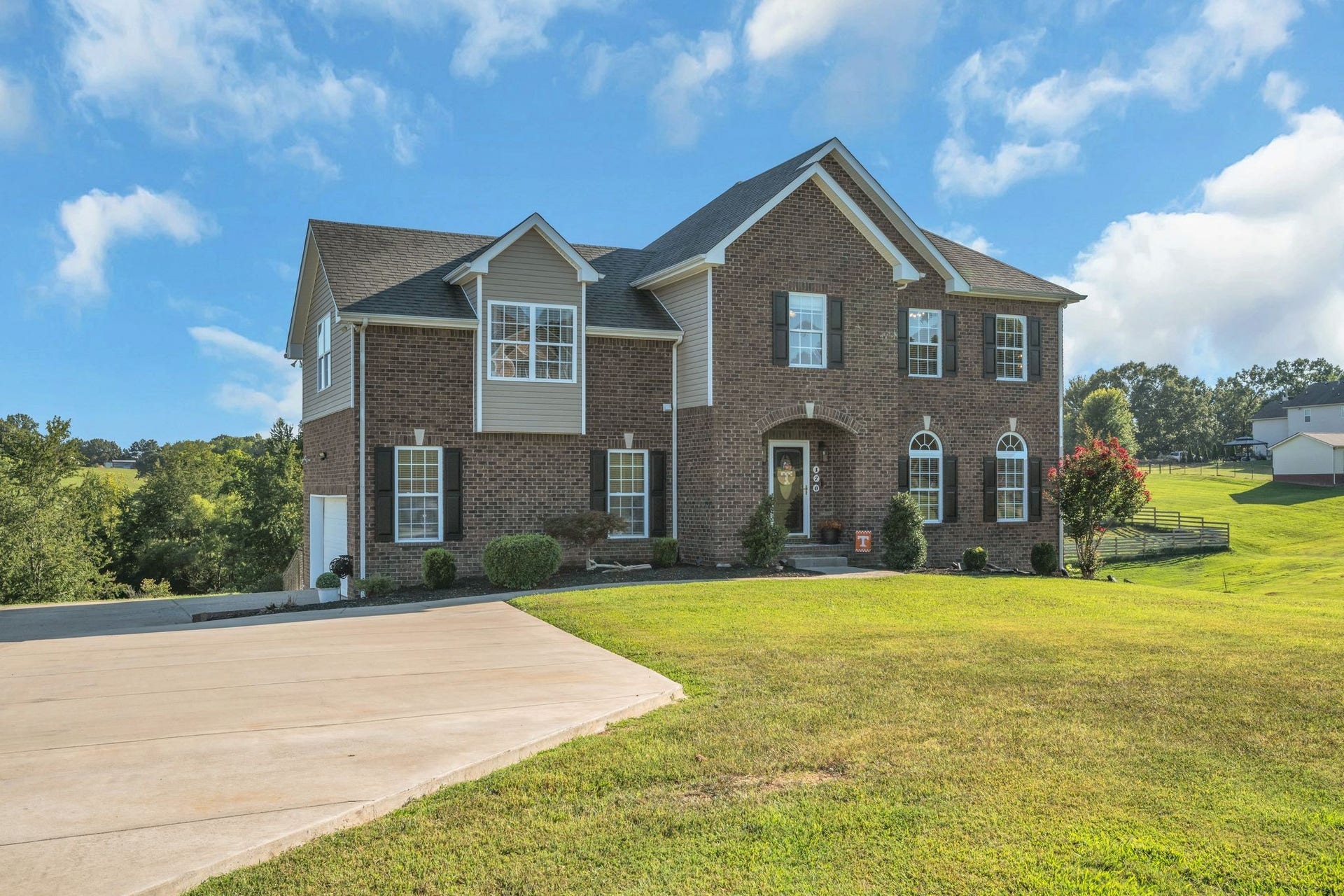 170 Lena Loop, Burns, TN 37029 2 story home with a full finished basement sitting on 1.05 acres