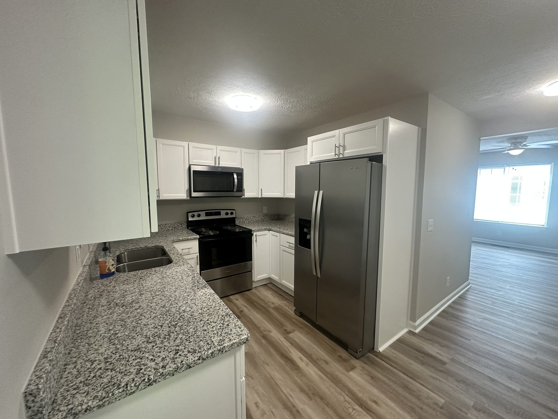 1506 Batts Blvd, #5, Springfield, TN 37172 Functional Kitchen: Cook comfortably with brand-new black/stainless appliances, including a refrigerator with an ice/water dispenser, dishwasher, range, and microwave. Plenty of drawers and storage, including a lazy Susan in the corner.