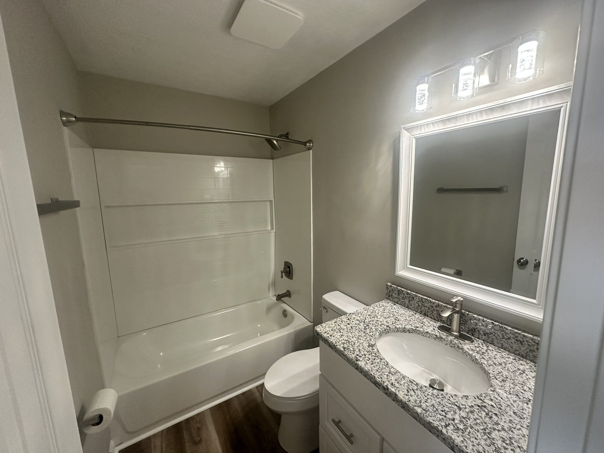 1506 Batts Blvd, #5, Springfield, TN 37172 Comfortable Retreat: Pamper yourself in the updated bathroom featuring a tile-like tub surround with shelf for toiletries, comfort height elongated toilet, quiet fan and LED lighting. You'll never have to change the bulbs!