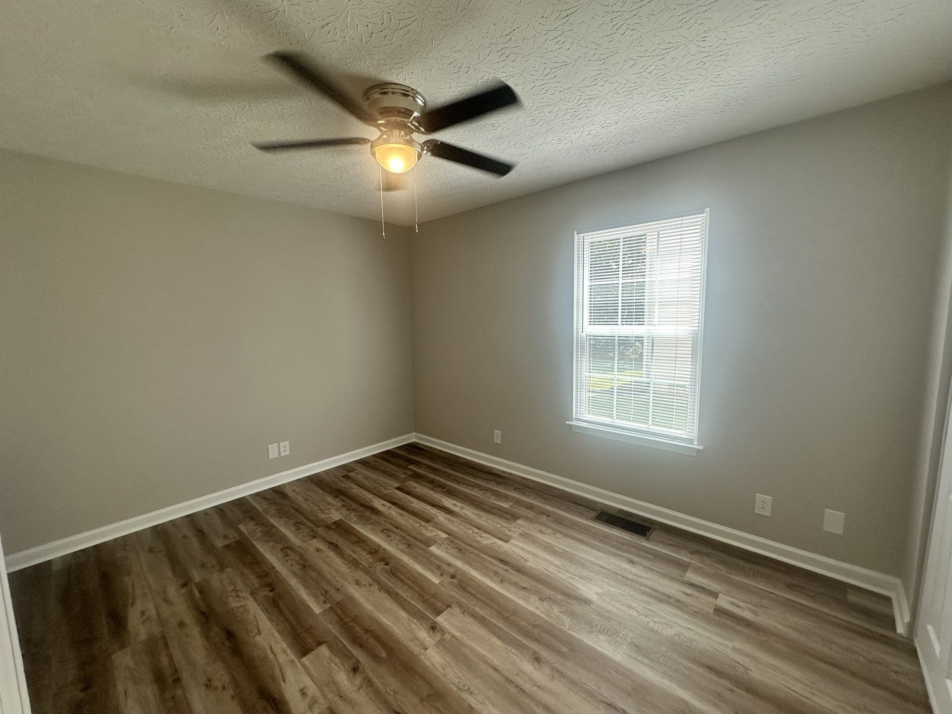 1506 Batts Blvd, #5, Springfield, TN 37172 Flexible Space: This oversized second bedroom, with LED ceiling fan, is perfect for guests, a home office, or a creative studio if you don't need a second sleeping area.