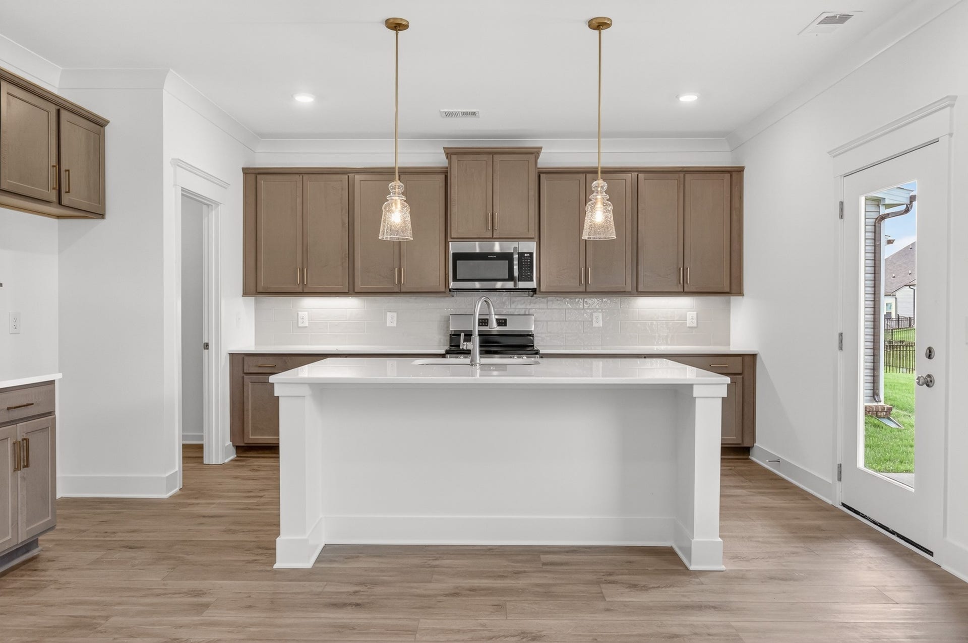 **Photos of model home and may not match subject property**