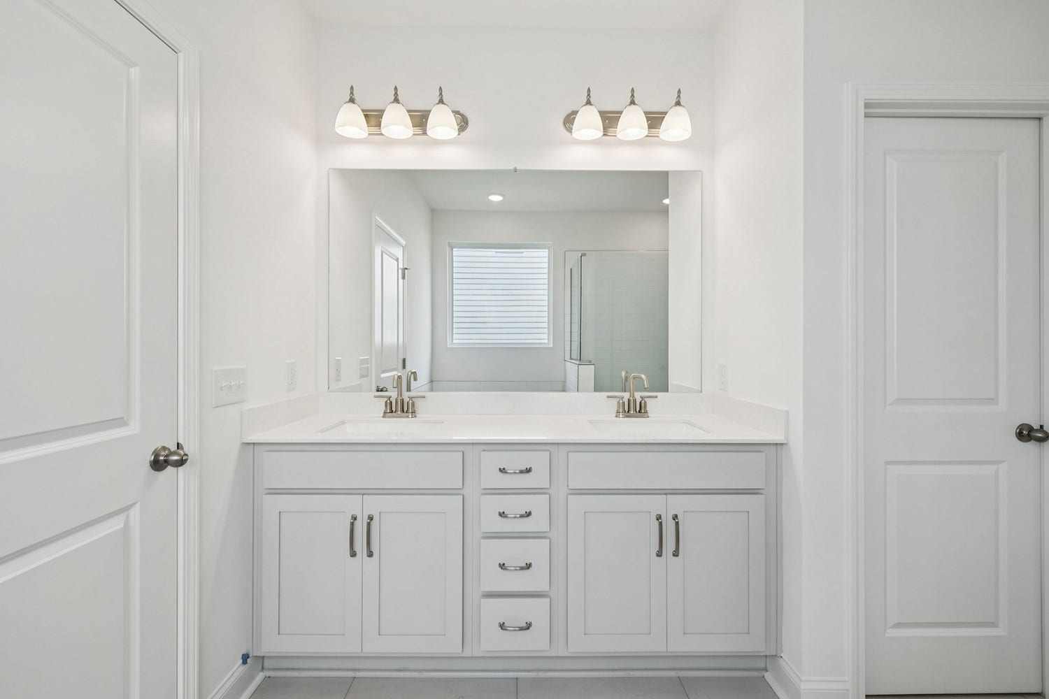 Macon primary bath. Photo is of similar home, same plan. Colors and options may vary.