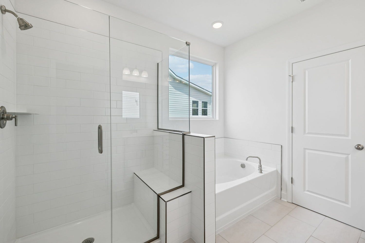 Macon primary bath. Photo is of similar home, same plan. Colors and options may vary.