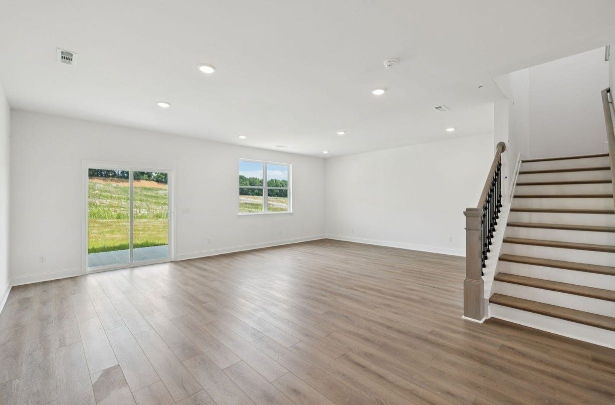 Macon living space. Photo is of similar home, same plan. Colors and options may vary.