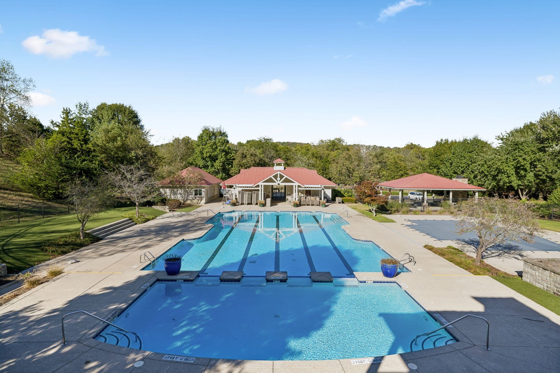 7460 Riverland Dr, Nashville, TN 37221 Pictured are three of the communitys four pools, including an adults-only pool and a separate pool for small children.