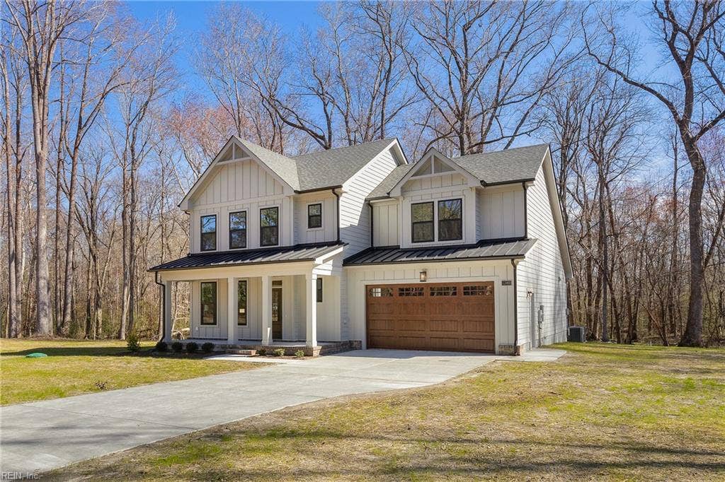 This beautiful new construction home is situated on 16+ acres in Southern Chesapeake and is conveniently located to shopping, dining, and interstate access.