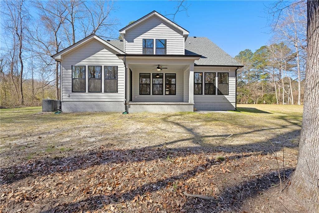 The Covered Porch with ceiling fan and light is the perfect spot to enjoy the serene and peaceful setting.
