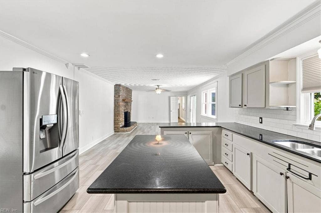 Updated kitchen with SS appliances and granite counters