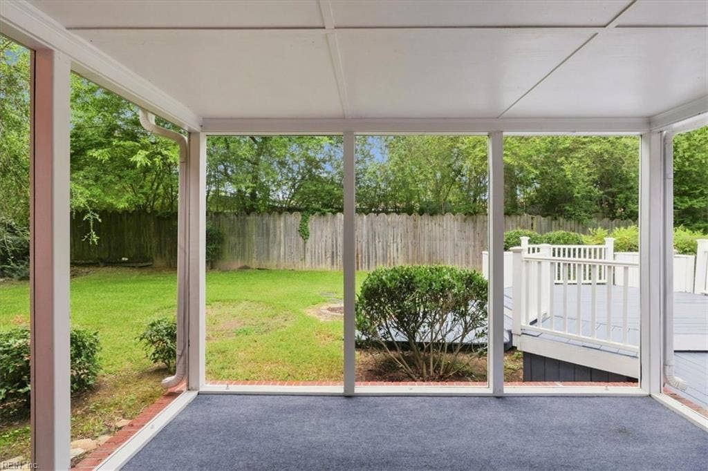 Screened back porch off family room.