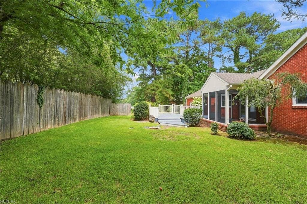 Spacious fenced backyard.