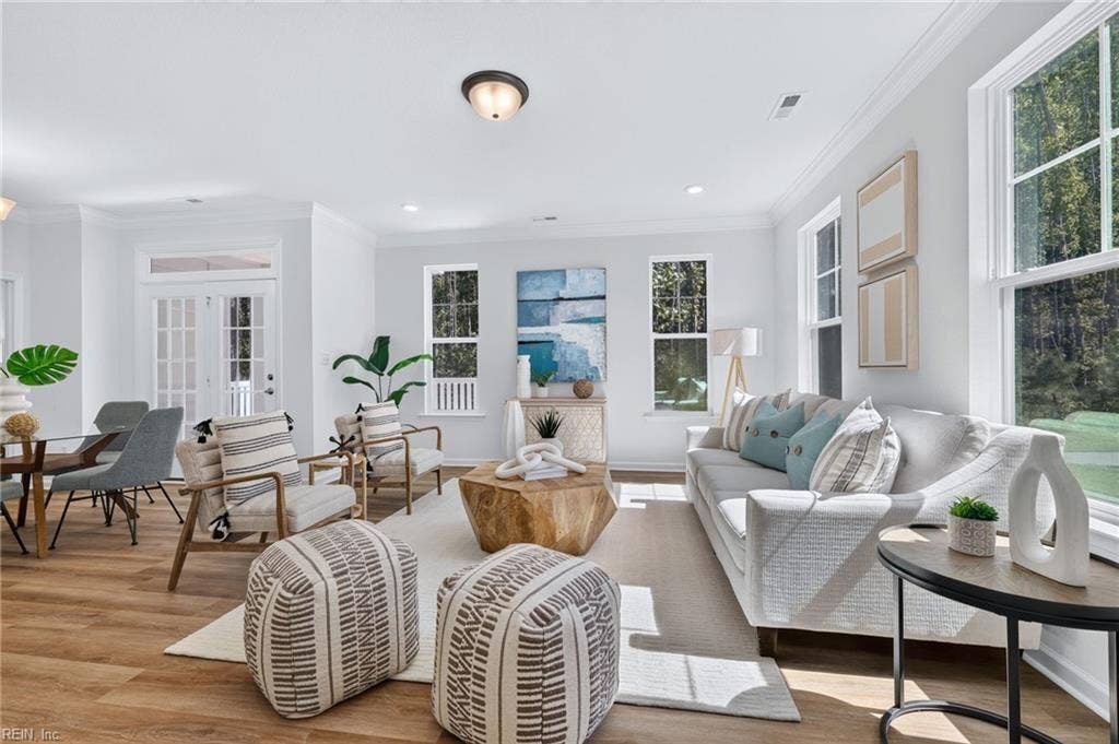 Family room with beautiful LVP flooring that carries through the 1st level