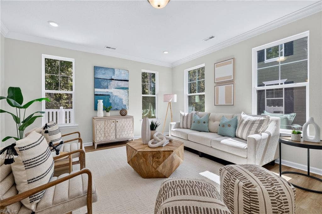 Family room with beautiful LVP flooring that carries through the 1st level