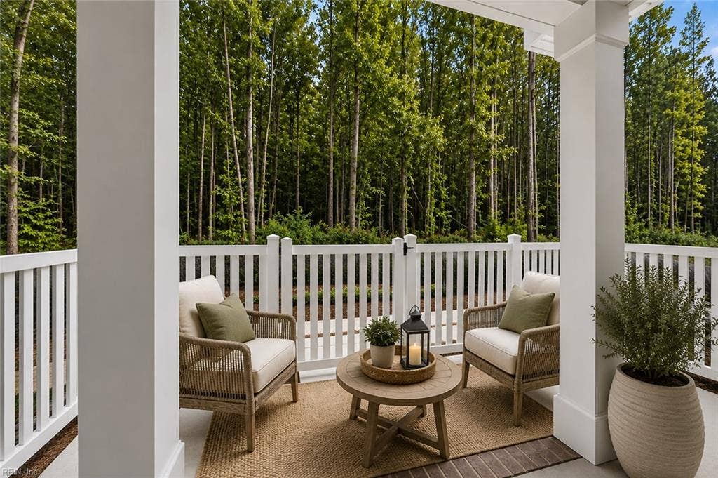 Virtually staged fenced in patio area