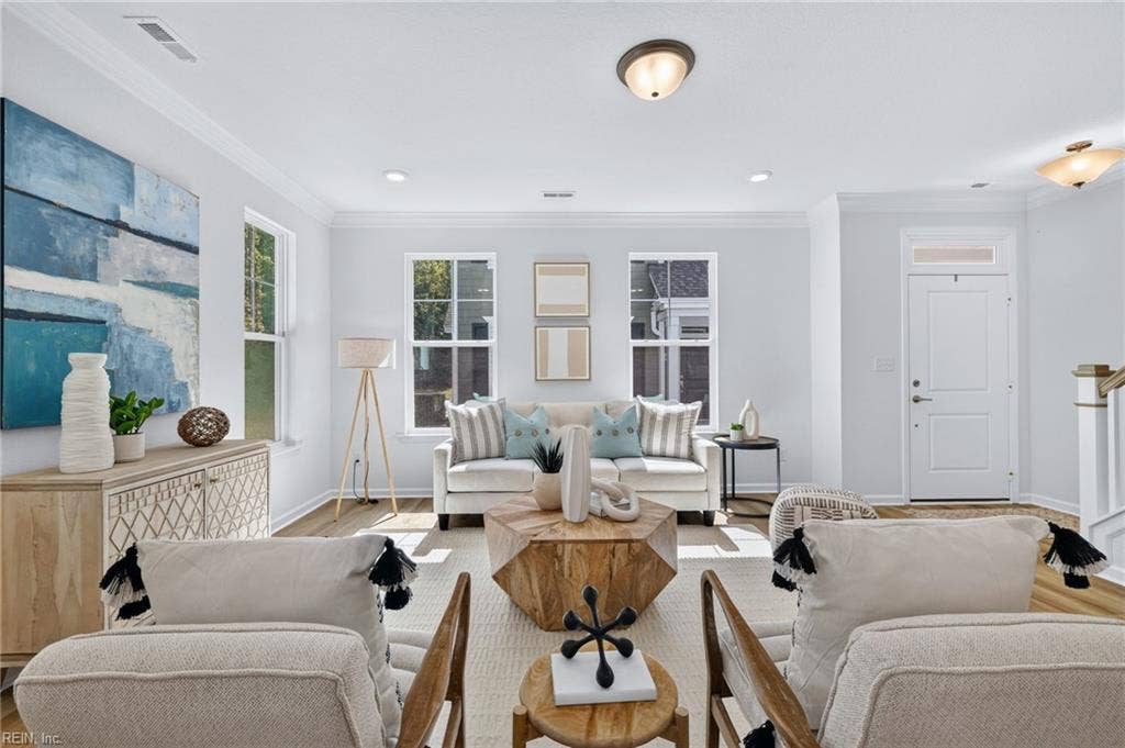Family room with beautiful LVP flooring that carries through the 1st level
