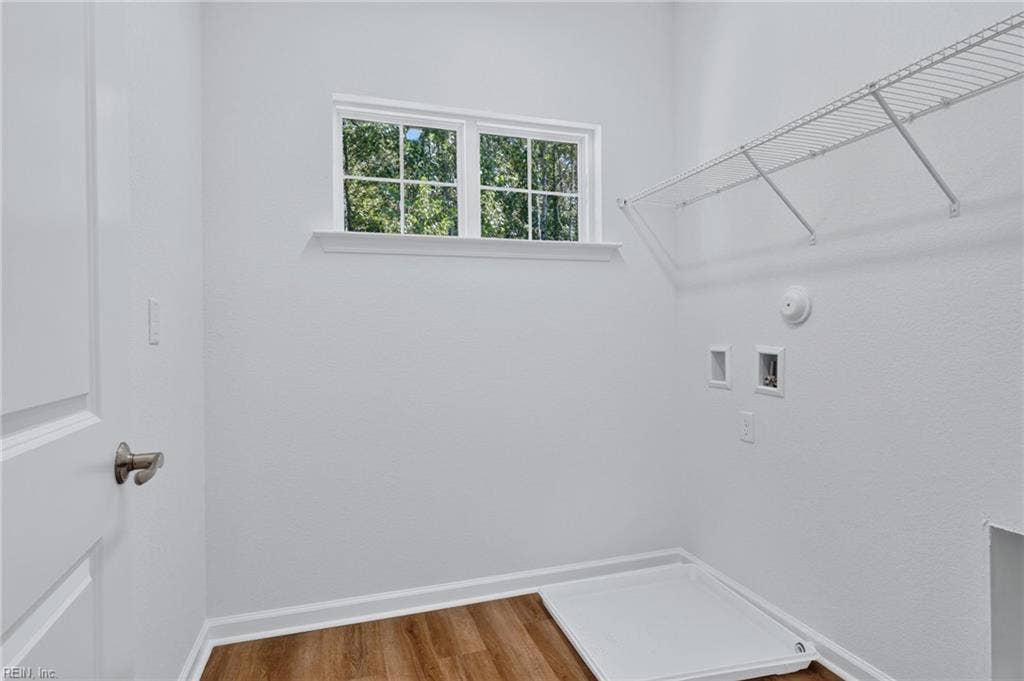 2nd level laundry room with additional storage