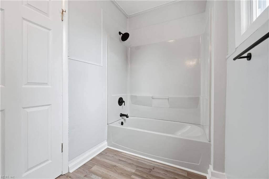 Bathroom has updated tub/shower, vanity, toilet, fixtures.Some Photos AI enhanced OR Virtually Staged