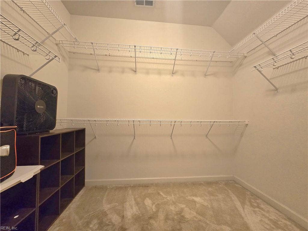 Big Primary walk in closet.