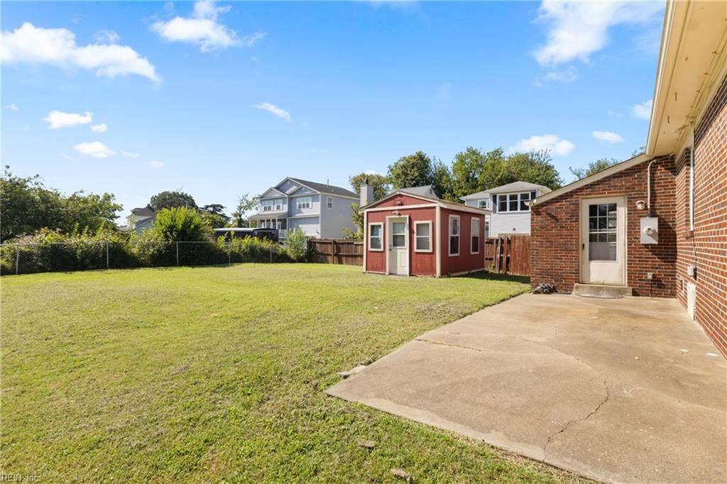 Backyard patio & Detached powered storage shed
