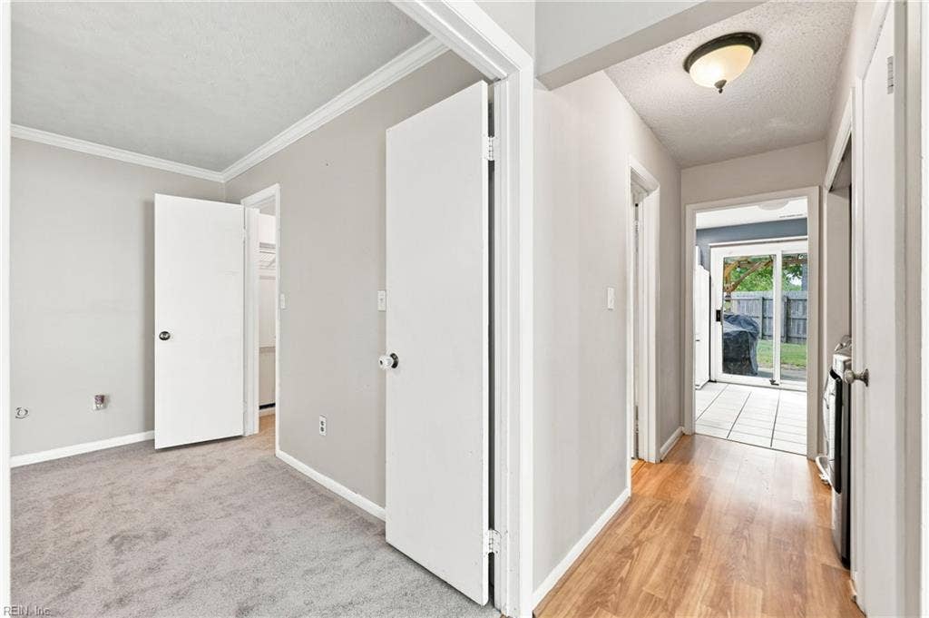 1517 Newport Circle, Virginia Beach, VA 23453 Entry to first floor primary, hall to laundry & kitchen