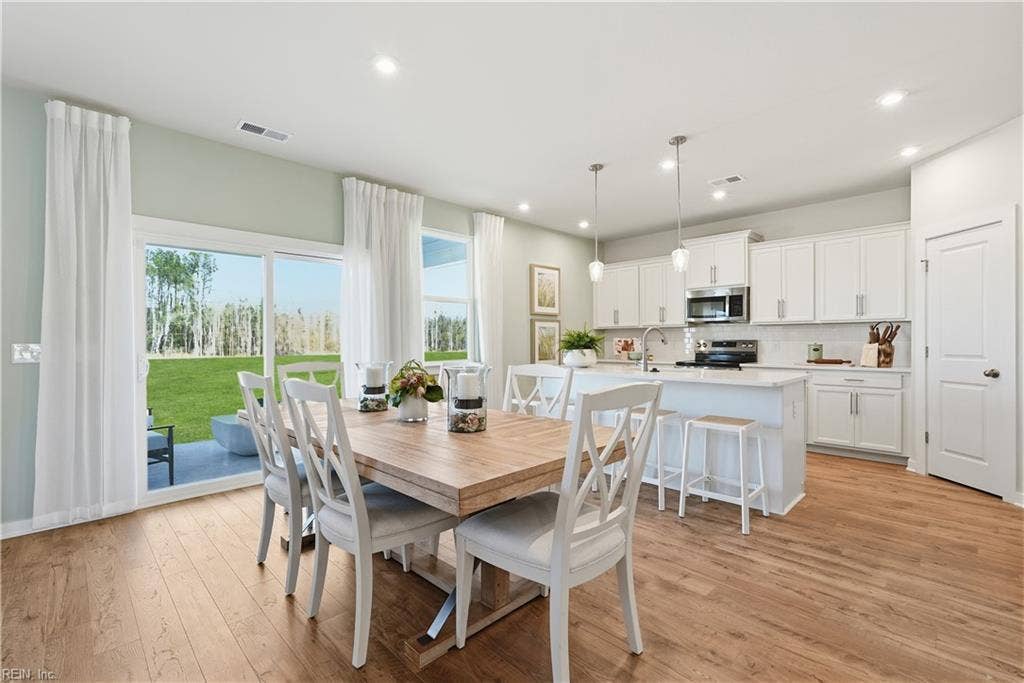 167 Getty Road, River Highlands, Suffolk, VA 23434 *Photo of Similar Decorated Model* Dining into Kitchen