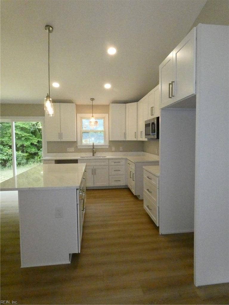28 Dixie Drive, Dixie Estates, Dutton, VA 23050 Kitchen features cabinets with easy close drawers and doors. Also, quartz counters.