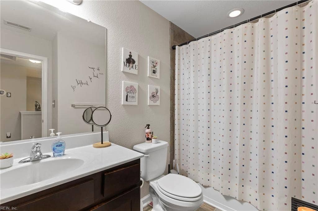 Hallway bathroom on level three.