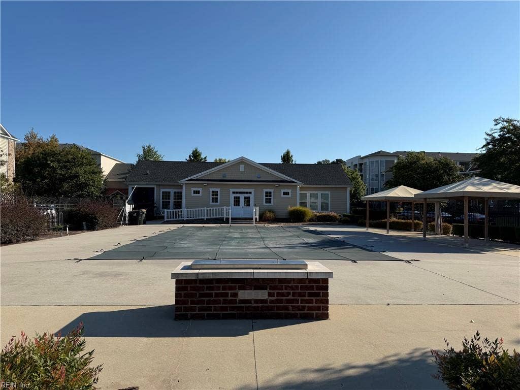 …a pool (closed for the season) and the clubhouse.  Cancel that gym membership because Inside the clubhouse is an exercise room.