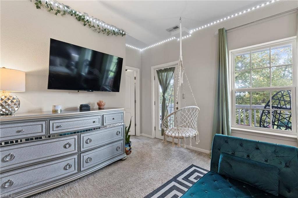 Closet door on the left.  Door leading to balcony on the right.