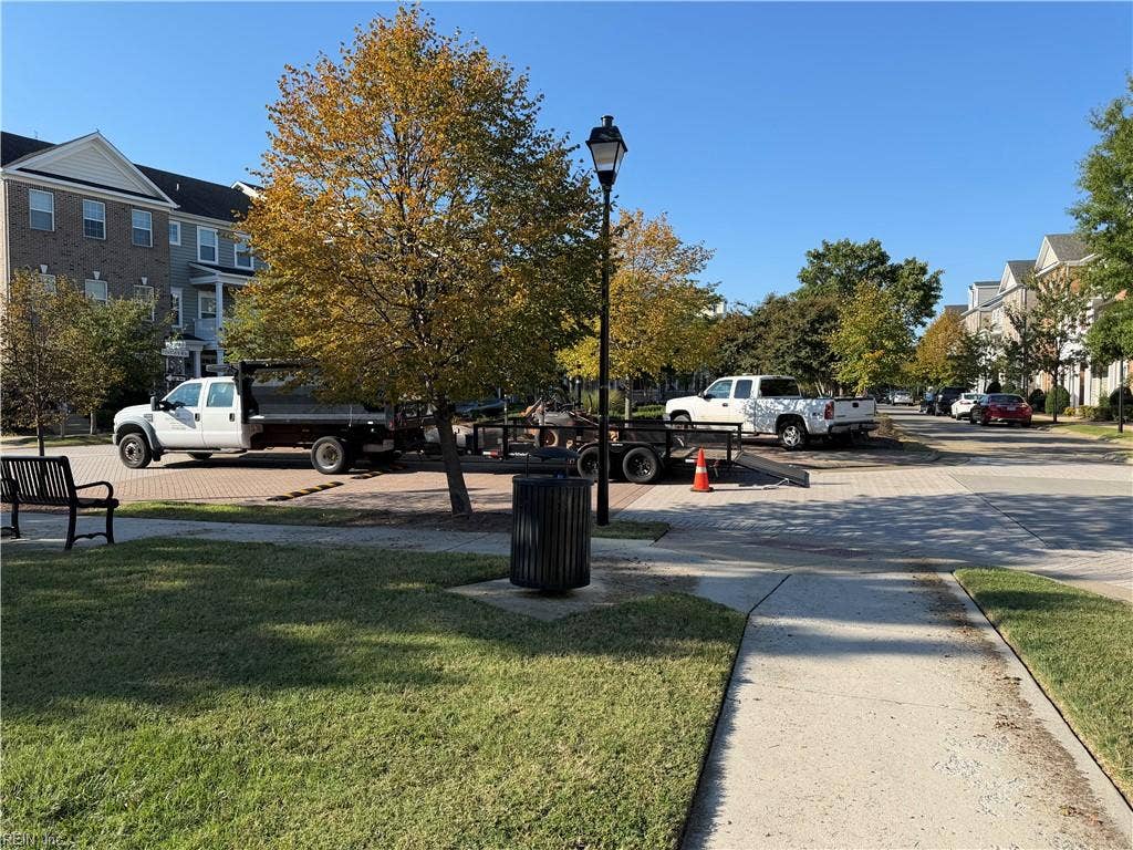 The ground maintenance crew was outside today.  No need for you to worry about cutting grass or raking leaves.