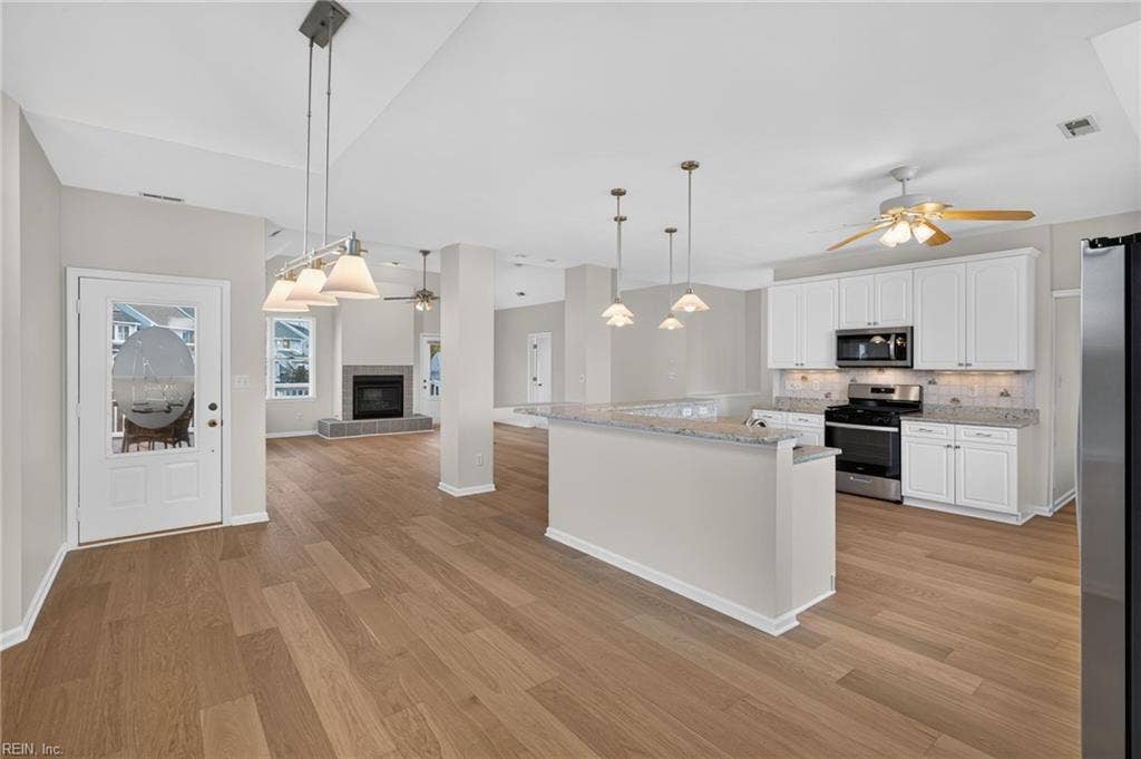 9570 Bay Point Drive, Bay Breeze Point, Norfolk, VA 23518 Newer wood floors throughout the main living level.