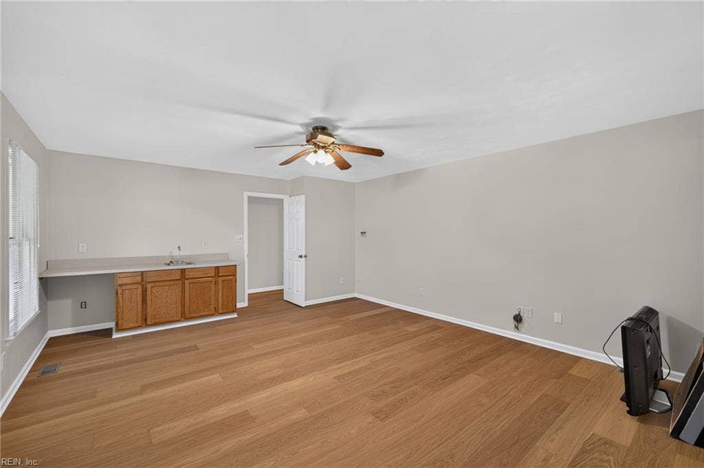 9570 Bay Point Drive, Bay Breeze Point, Norfolk, VA 23518 Another view of this great in-law suite with its unique built-in counter, sink, and space for a mini fridge, and separate entrance.