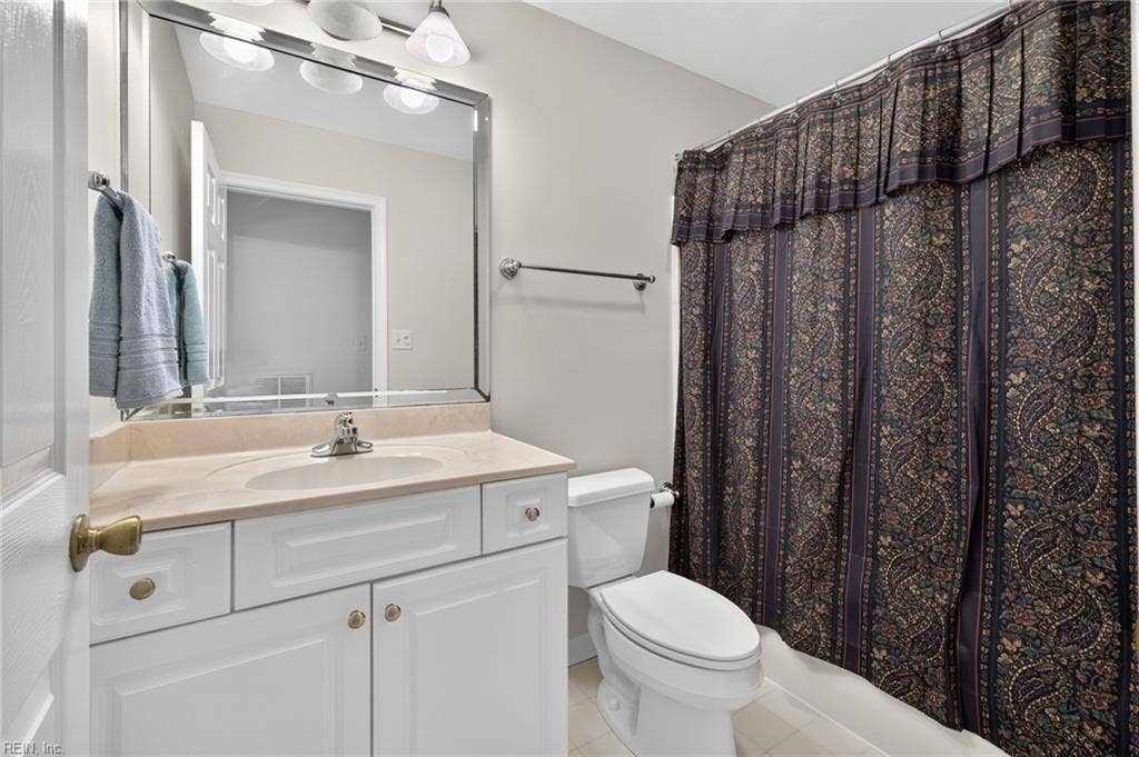 9570 Bay Point Drive, Bay Breeze Point, Norfolk, VA 23518 This additional full bath serves the first level.