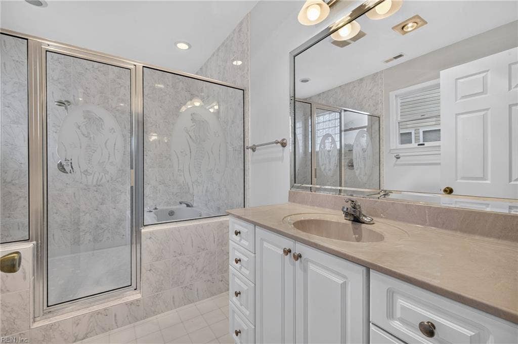 9570 Bay Point Drive, Bay Breeze Point, Norfolk, VA 23518 Incredible primary bath with custom shower and tub.
