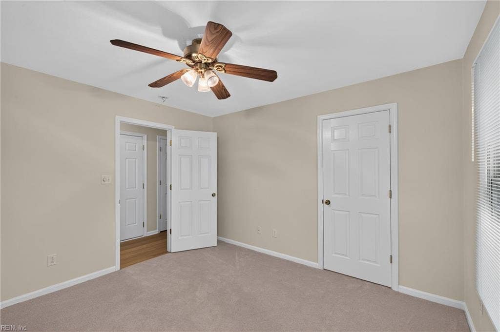 9570 Bay Point Drive, Bay Breeze Point, Norfolk, VA 23518 The first level boasts a third bedroom. New carpet in this room as in all carpeted areas.