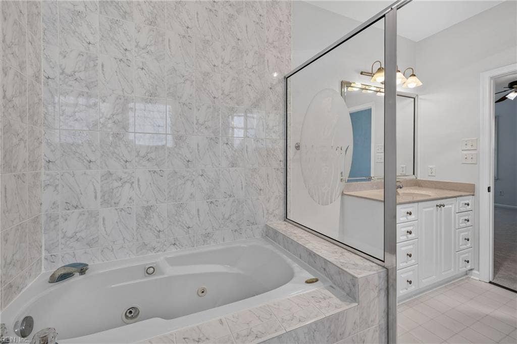 9570 Bay Point Drive, Bay Breeze Point, Norfolk, VA 23518 Look at this dreamy jetted tub contained within the custom tiled shower!