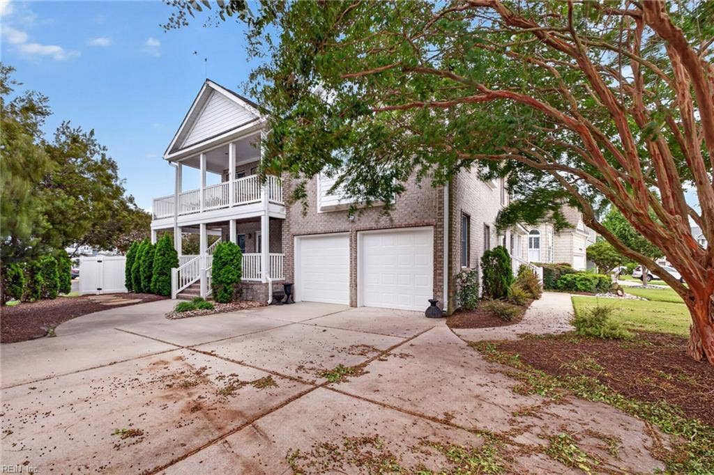 9570 Bay Point Drive, Bay Breeze Point, Norfolk, VA 23518 Dual attached garages and tons of parking which is so unique and special for beach living.