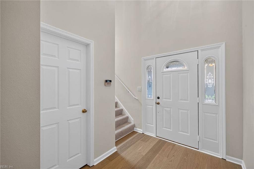 9570 Bay Point Drive, Bay Breeze Point, Norfolk, VA 23518 You enter this special home with a front door with side lights.