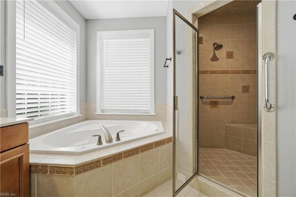 613 Mcrowland Way, Vance Level, Chesapeake, VA 23320 Primary bathroom with tub and walk-in shower.